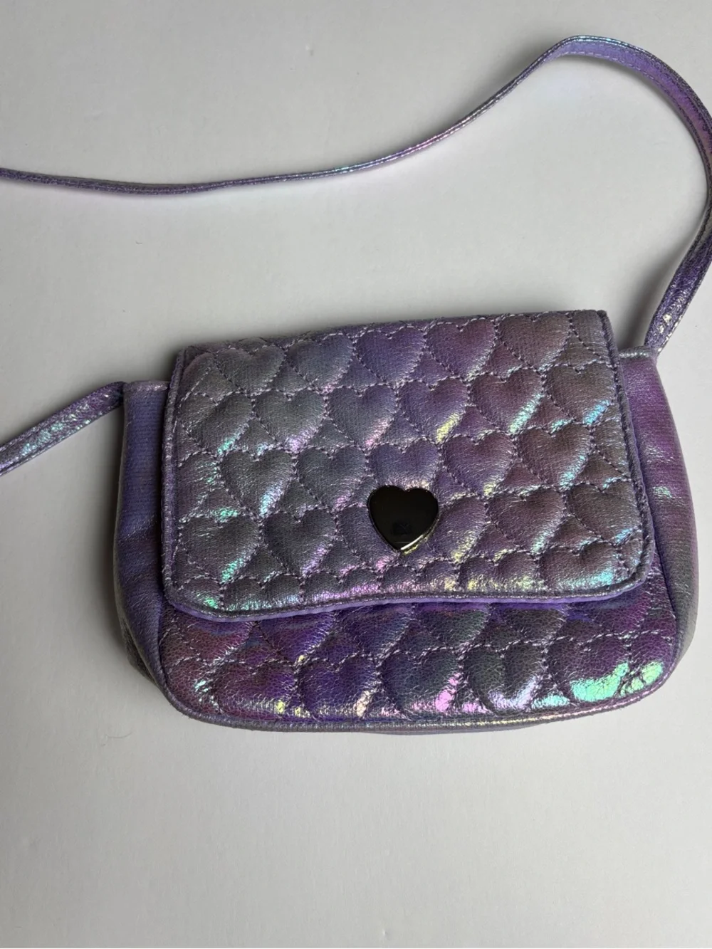 Capelli of New York Iridescent Purple Quilted Heart Crossbody